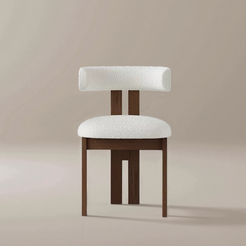 Bouclé Ash Wood Dining Chair with a textured white bouclé seat and backrest, paired with a solid ash wood base in a neutral studio setting