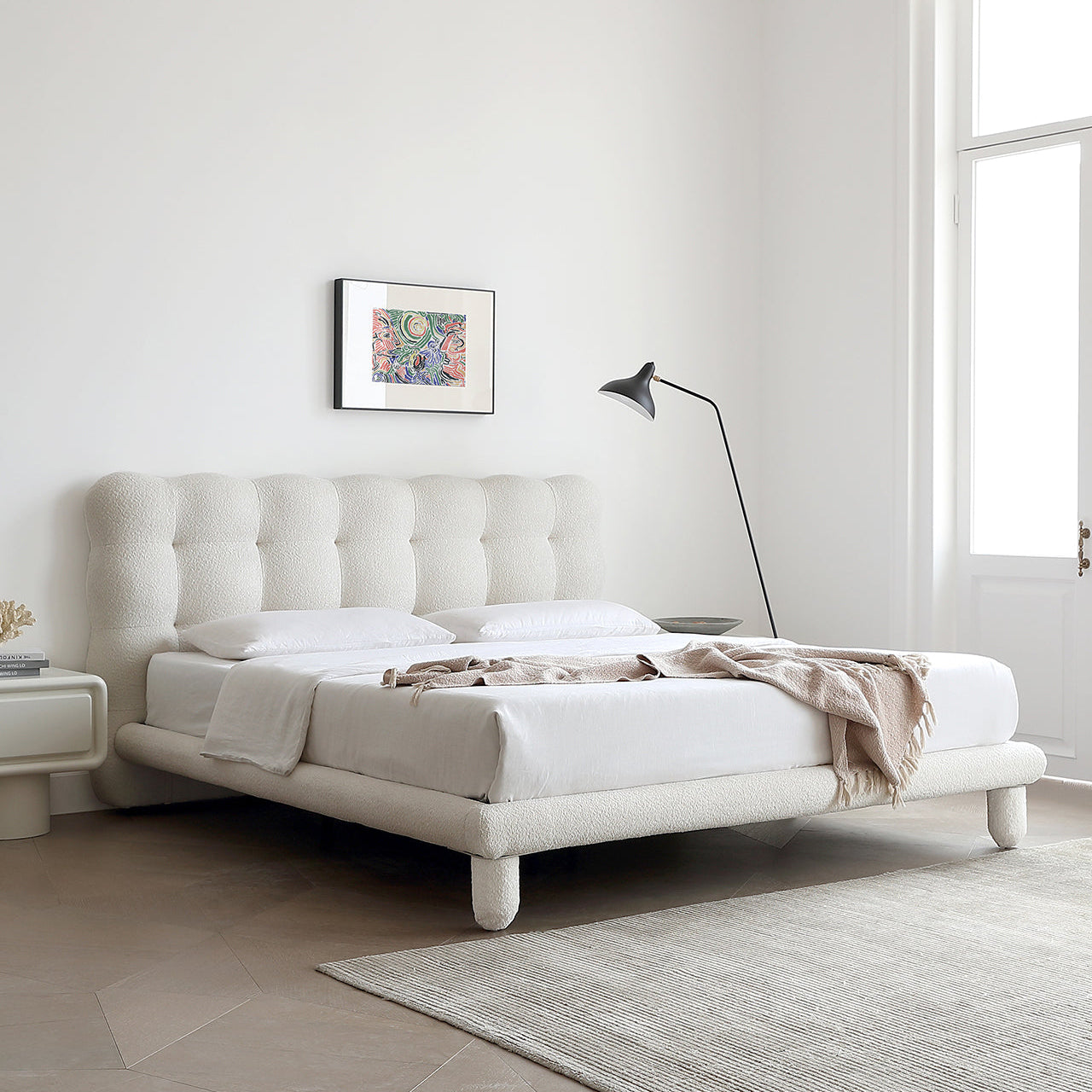 Bubbly Bliss Bed in white boucle fabric with tufted headboard styled in a bright minimalist bedroom with modern decor