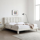 Bubbly Bliss Bed in white boucle fabric with tufted headboard styled in a bright minimalist bedroom with modern decor