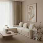 Bulgari Charm Tall Side Table styled beside a modern sectional sofa in a warm neutral living room setting