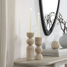 Caelo Candle Duo displayed on console table with lit candles beside mirror and ceramic vase for a modern minimalist decor look