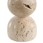 Close-up of Caelo Candle Duo showing natural travertine stone texture with organic pores and warm beige surface details