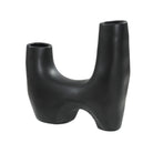 Caldera Vase in matte black finish featuring modern arched base and dual top openings