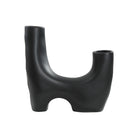 Caldera Vase in matte black finish with modern sculptural U-shaped design and twin openings