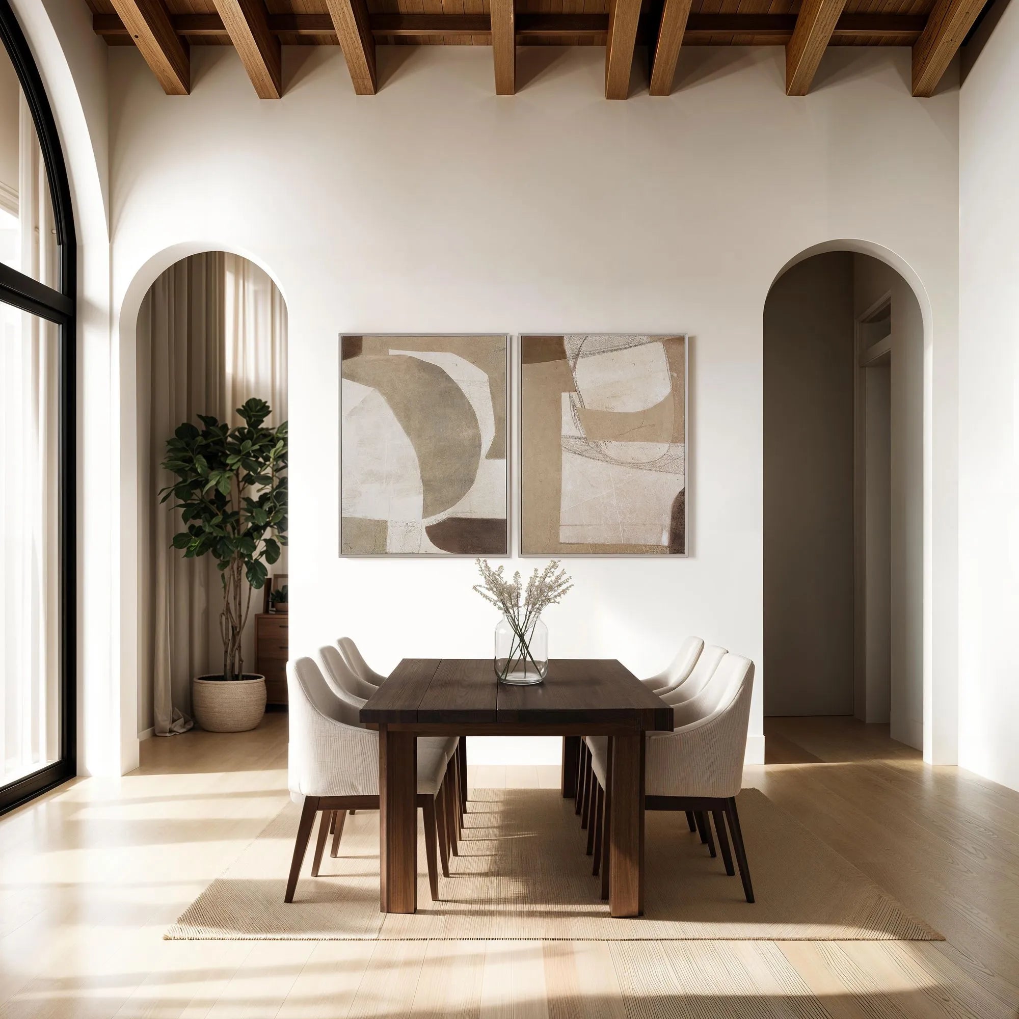 Calma Horizon abstract wall art set displayed above a dining table in a styled interior with arched doorways and soft natural light