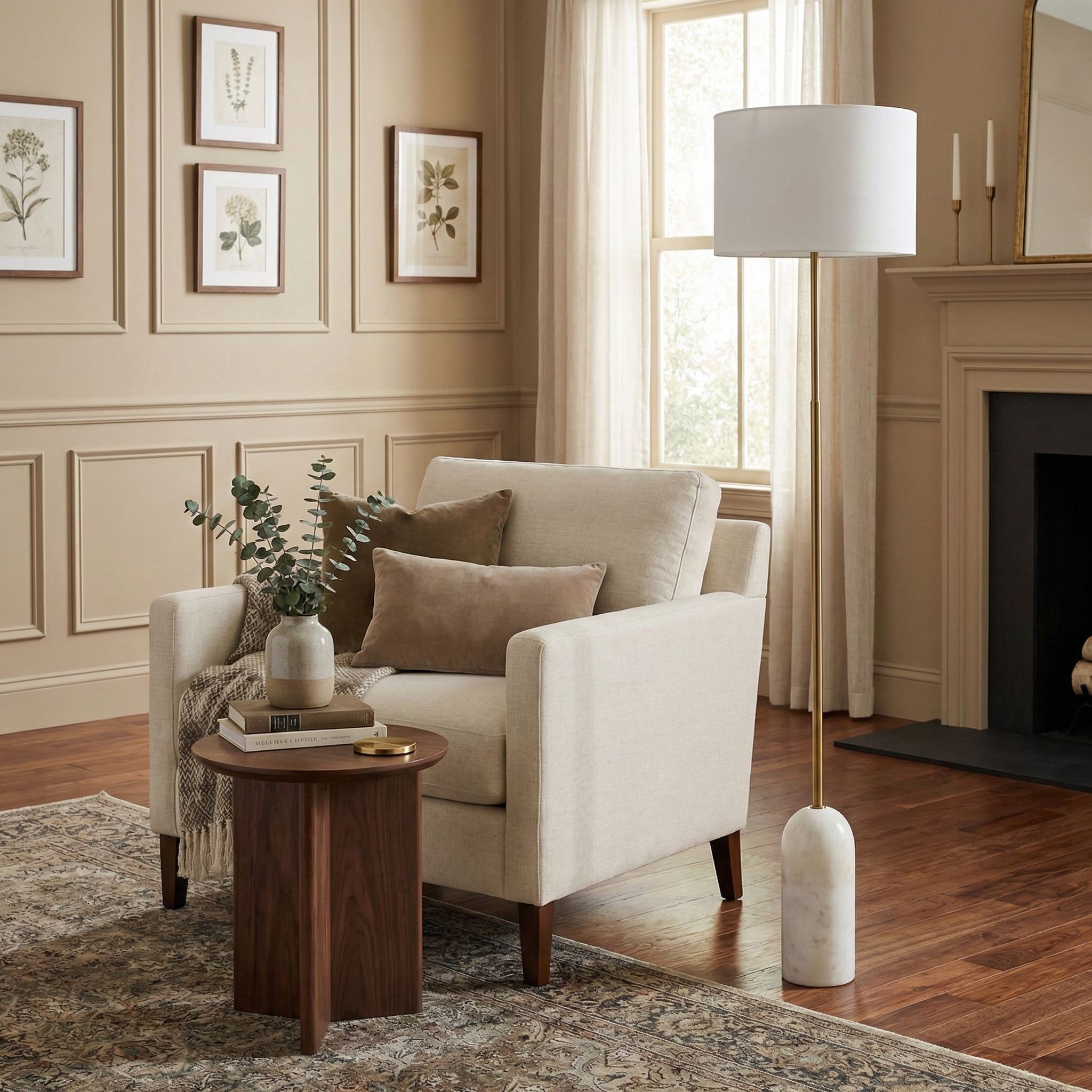Celine marble floor lamp styled in a cozy neutral living room next to a cream armchair and wood side table.