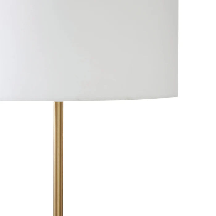 Close up of the Celine floor lamp's white linen shade and decorative brass finial knob.