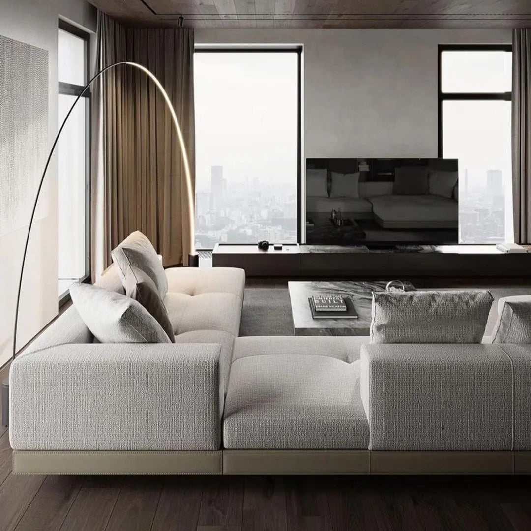 Back view of Cityscape Modular Sofa in light grey linen with low profile design and sleek lines in modern city-view living room