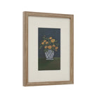 Angled view of the Clementine floral wall art highlighting its natural light wood frame and crisp white matting.