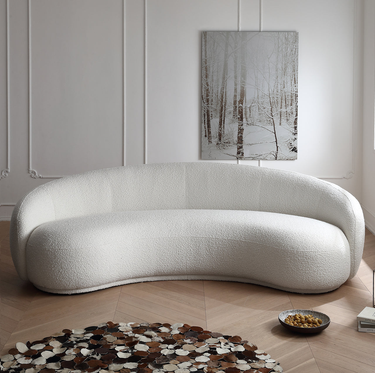 Contour Bliss Bouclé Sofa in white bouclé fabric with curved design in modern living room interior