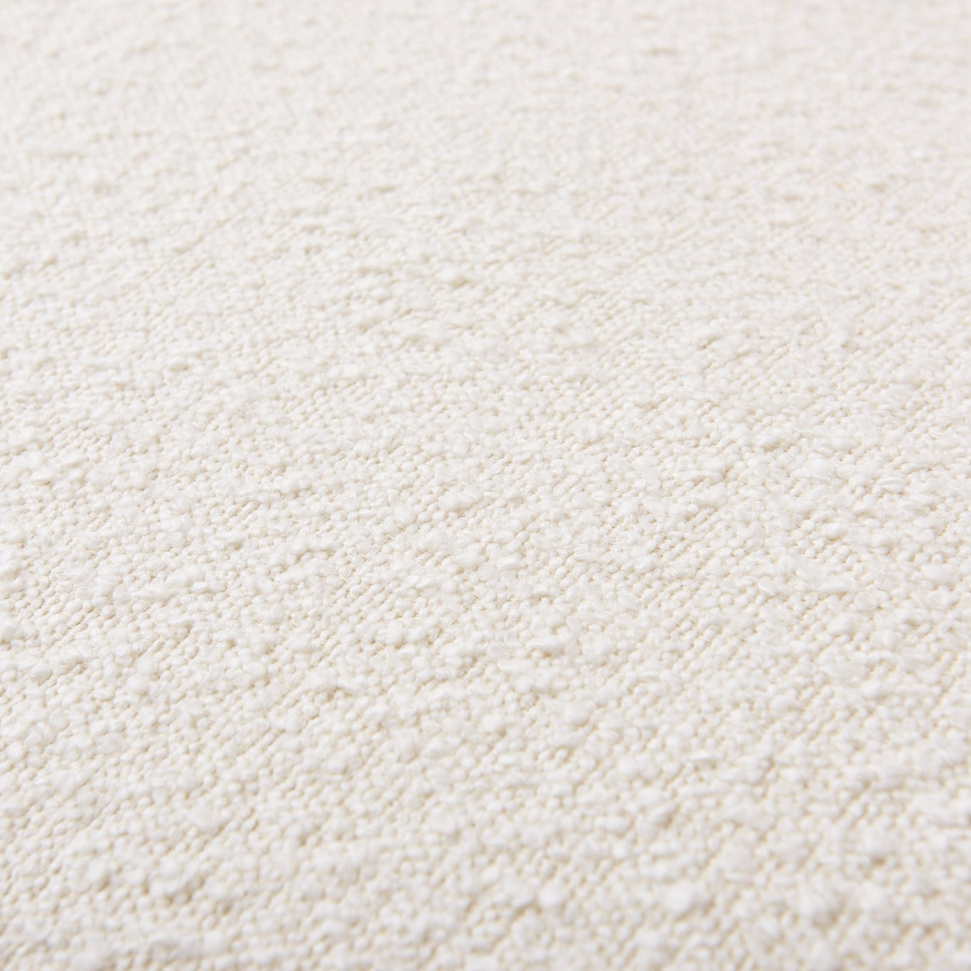 Close-up of a textured pebbleloop boucle fabric surface