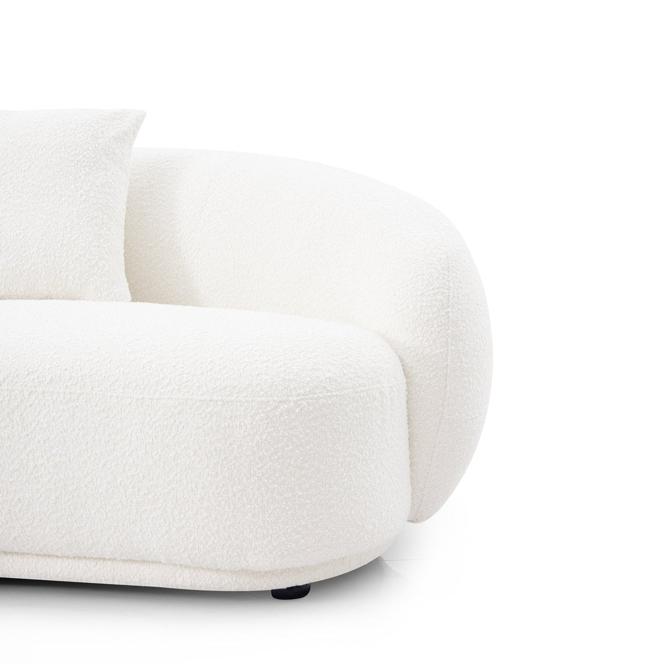Detail view of the Contour Bliss Boucle sofa on a white background