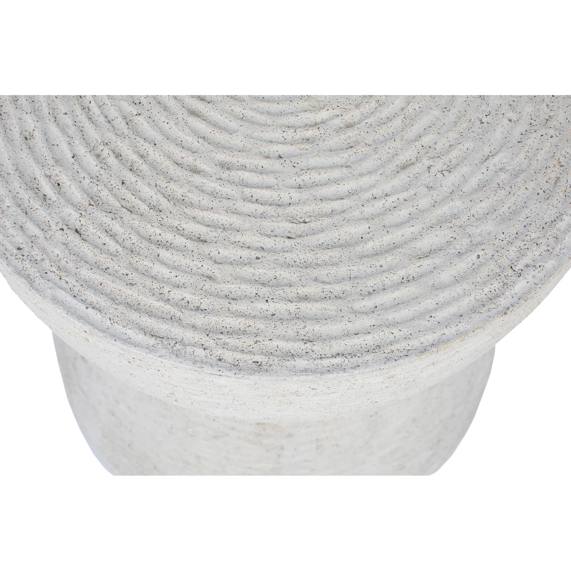 Top-down view of the Dune side table highlighting the concentric spiral pattern and rough concrete texture.