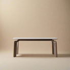 Front view of Eclipse Elegance dining table with sintered stone top and curved solid wood legs on beige studio background