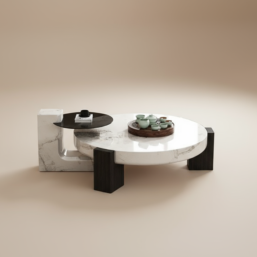 Elegant Fusion Coffee Table Set featuring a circular marble design with layered black and white tops in a modern studio setting