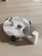 Elegant Fusion Coffee Table Set viewed from above, showing white marble surface with dark veining and black side table accent