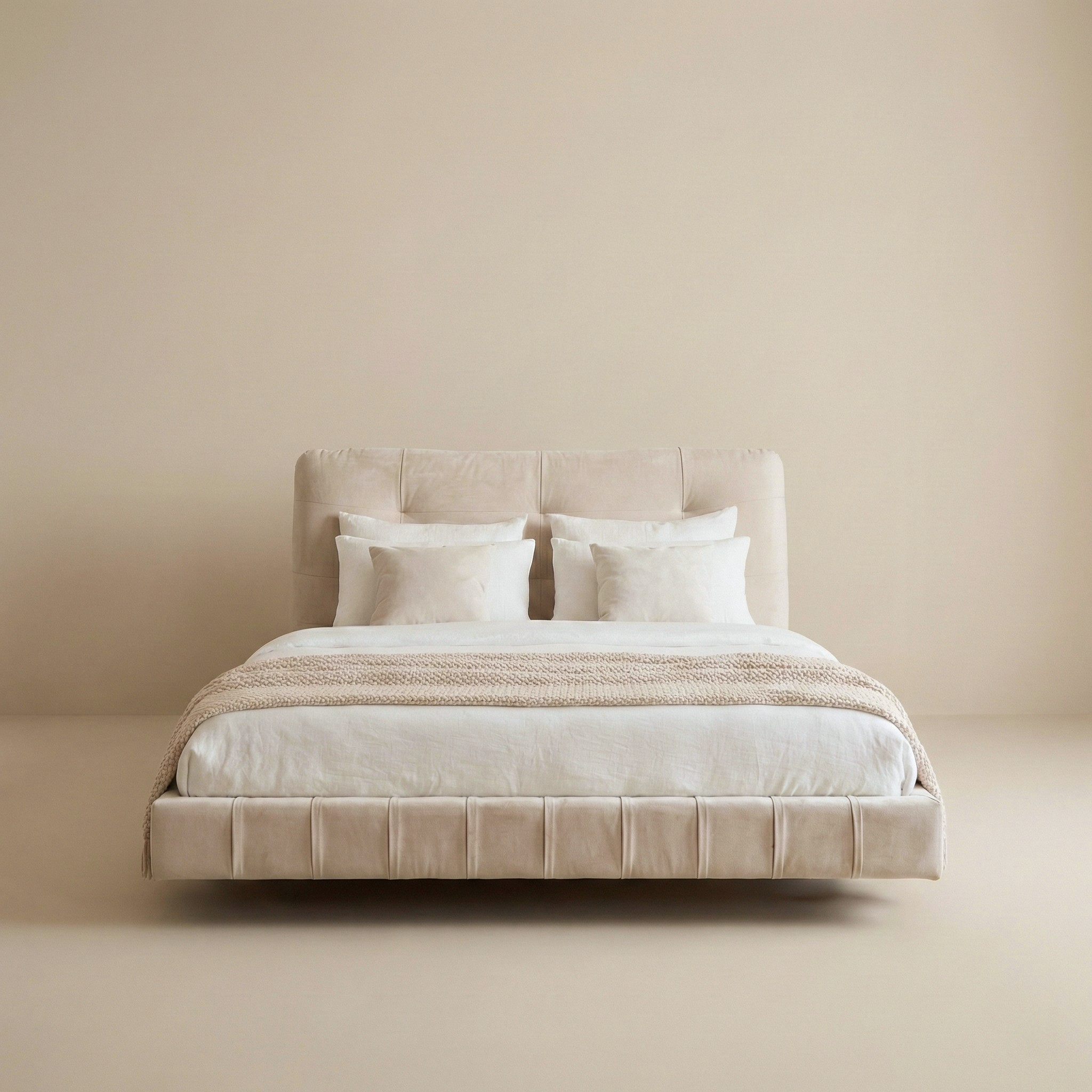 Front view of the Floating Platform Bed Frame in cream velvet featuring vertical channel tufted side rails and a matching low-profile headboard.