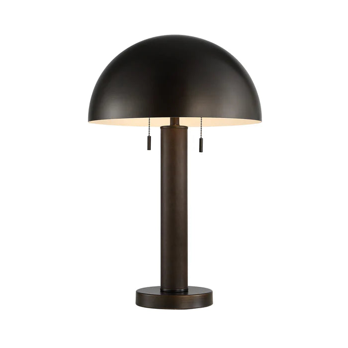 Harrison table lamp featuring a dark bronze dome shade and double pull chain switches, casting a warm downward glow.