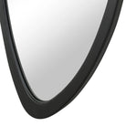 Close-up of the Isla Wall Mirror showing its asymmetrical black frame detail.