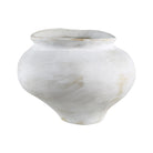 Leros Vase with sculptural rounded form and handcrafted white ceramic finish on studio background
