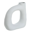 Lunara Vase in matte white with modern sculptural shape and curved open center, side angle view
