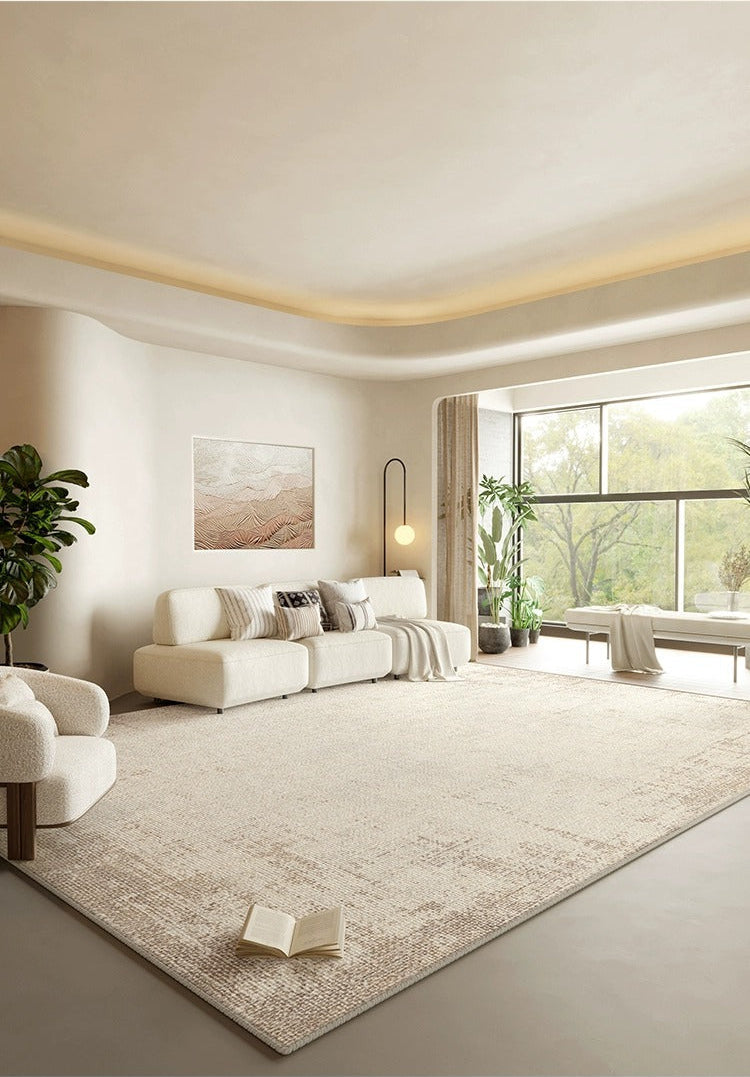 Luxe Earth Tone Rug styled in a bright neutral living room with a cream sofa and warm decor accents