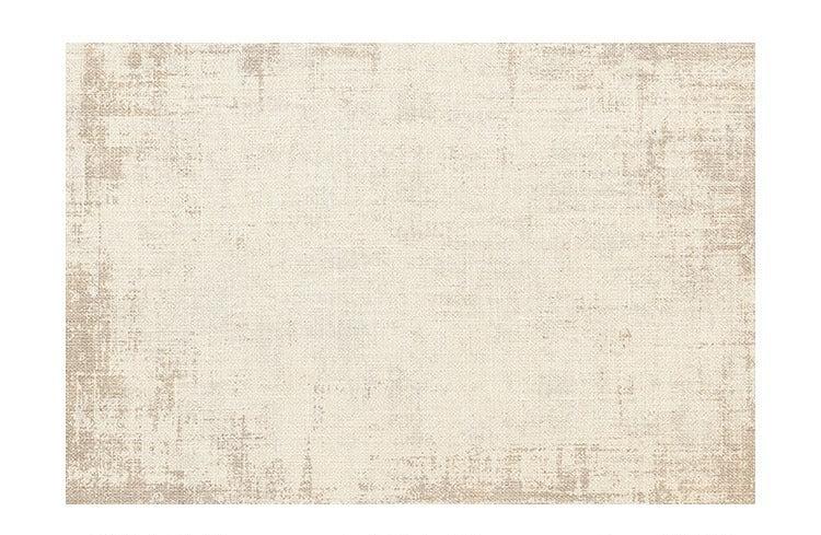 Luxe Earth Tone Rug with a subtle distressed texture in soft beige and cream tones