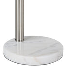 Close-up of Lyra Arc Floor Lamp featuring smooth round white marble base and brushed steel stem