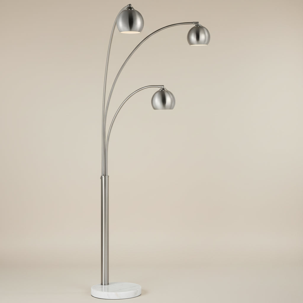 Lyra Arc Floor Lamp with three brushed steel dome shades and marble base