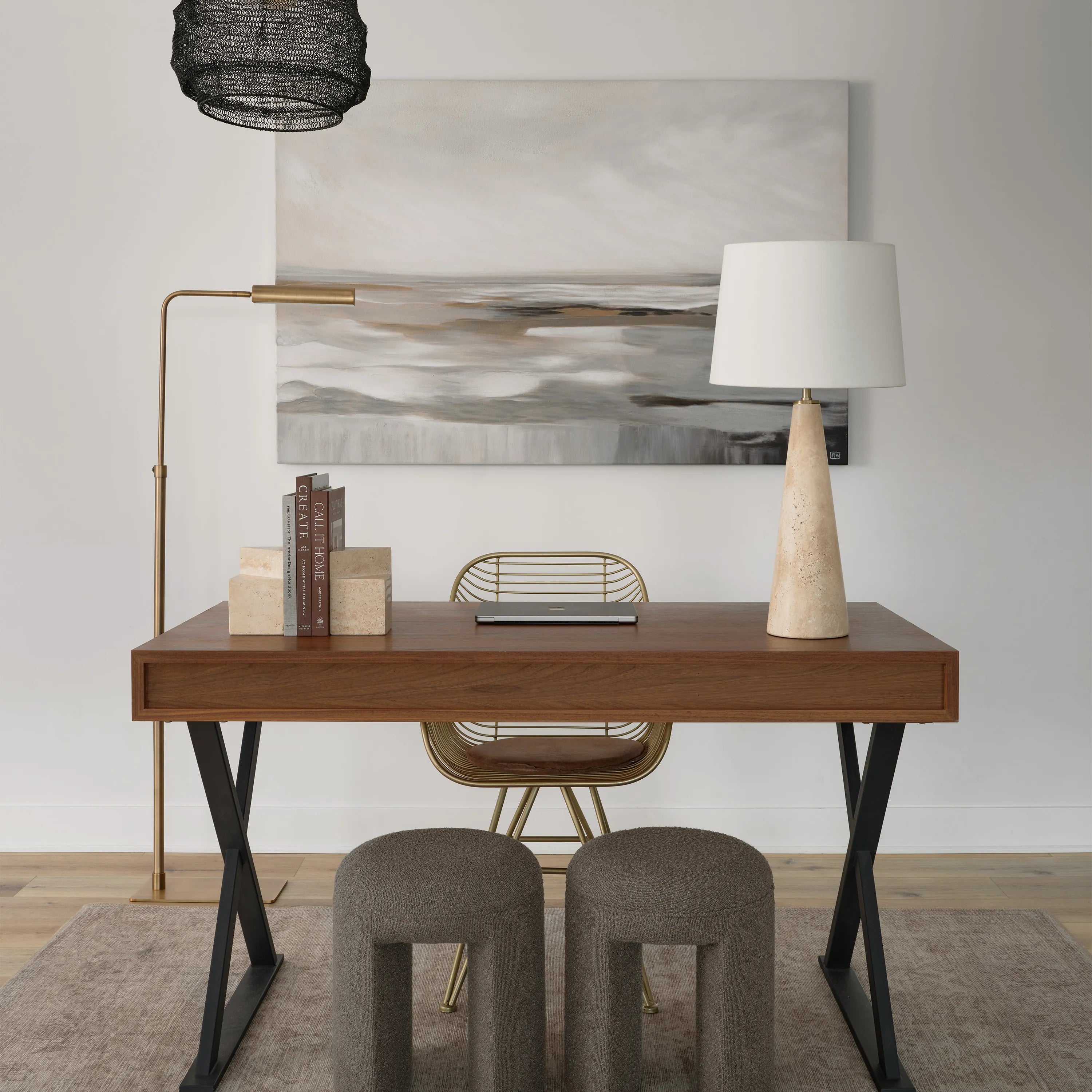 Marlo Travertine Table Lamp on modern wooden desk with gold chair and neutral artwork in contemporary office