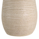 Close-up of Mesa Glow Table Lamp base showing textured ceramic pattern in warm beige tone