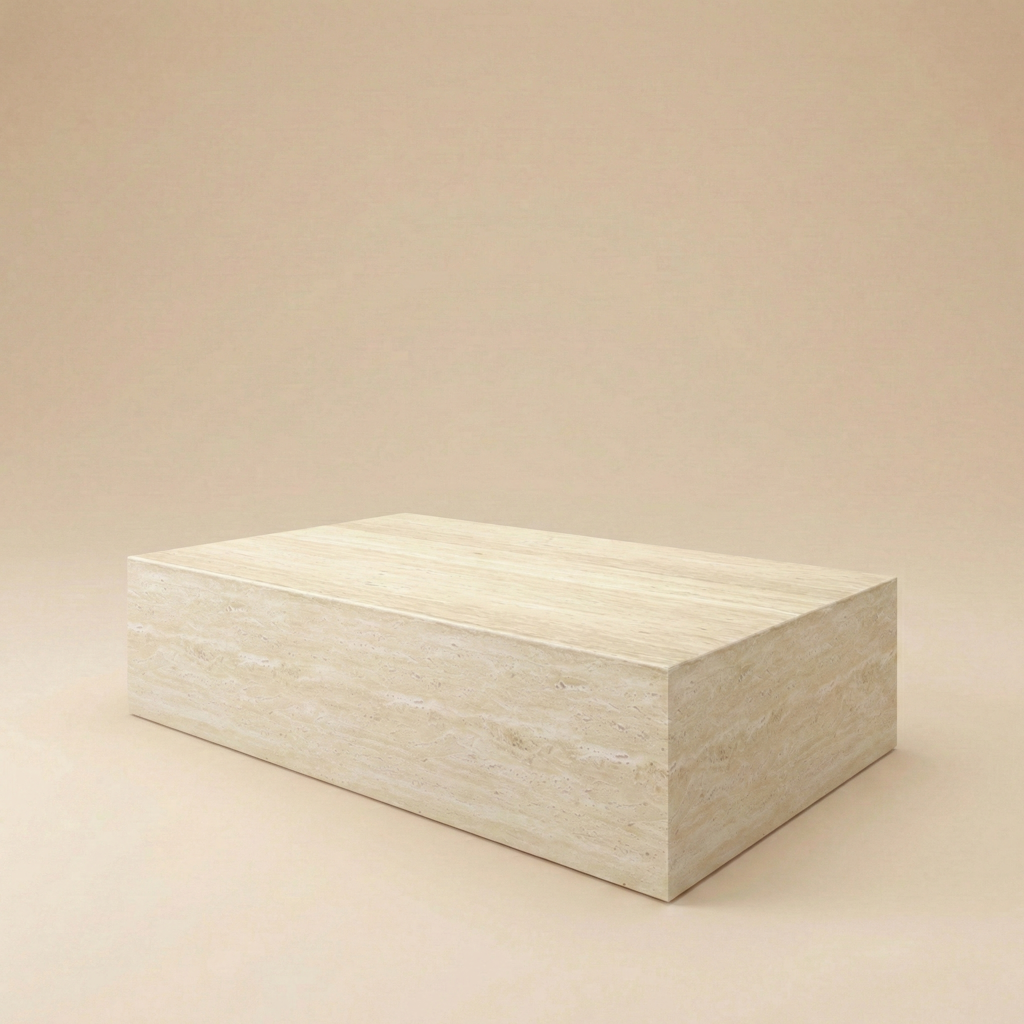 Mono Travertine Coffee Table featuring a minimalist rectangular slab block design with a smooth, matte beige stone finish.