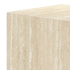 Close-up of the mono travertine tall side table