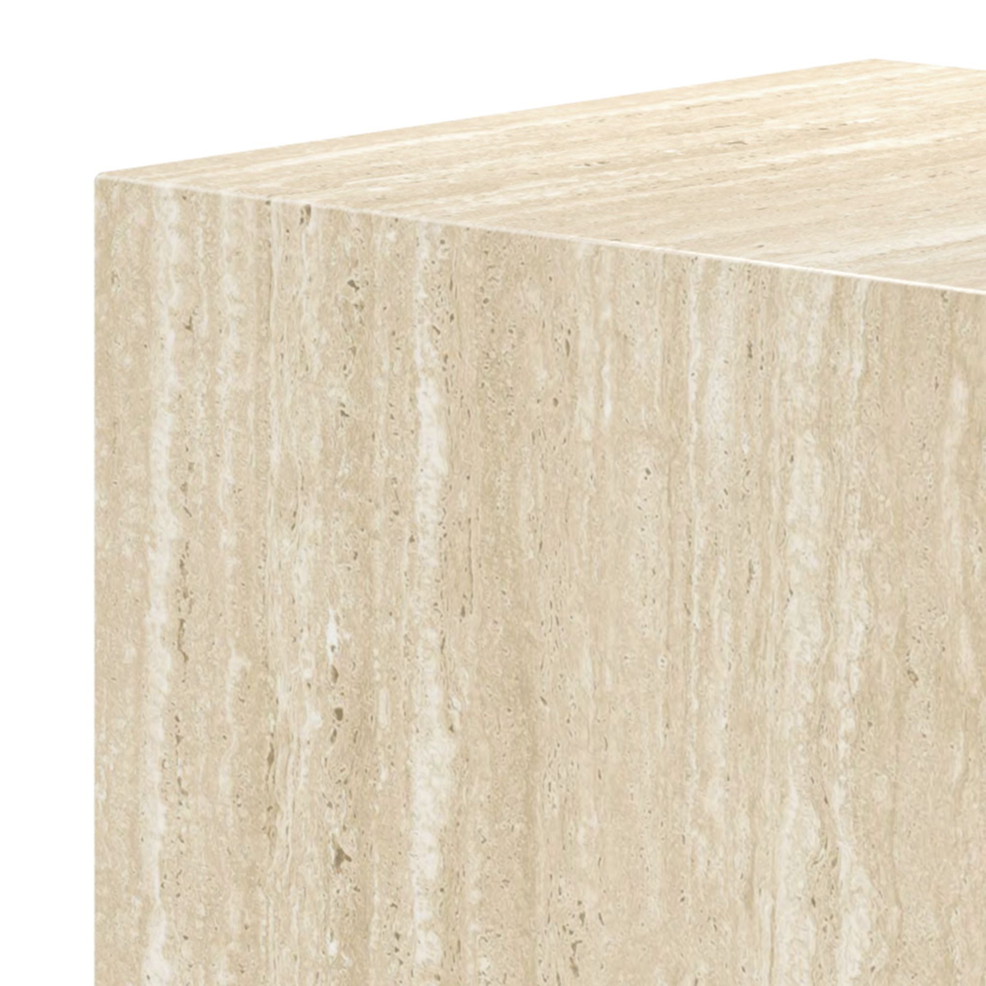 Close-up of the mono travertine tall side table