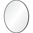Nova Wall Mirror in a round shape with a slim black frame shown from an angled view