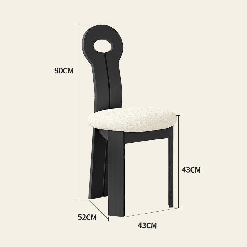 Dimension diagram of the Obsidian Loop Dining Chair showing height, seat width, and depth measurements with a black looped backrest design