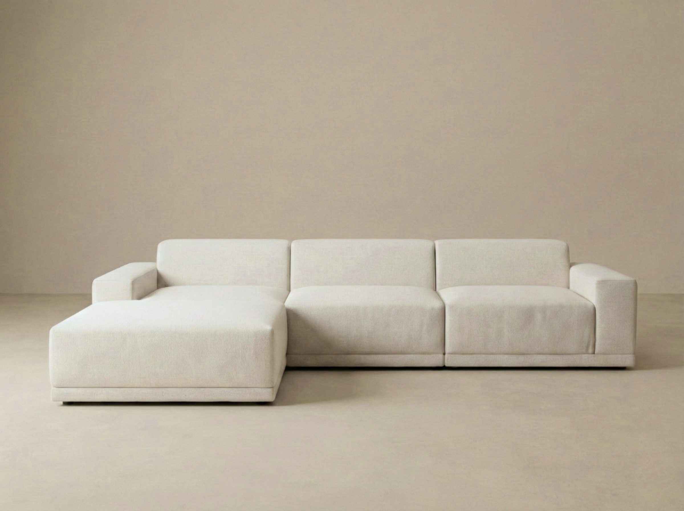 Solis Linen Modular Sofa in beige featuring a left-facing chaise lounge configuration and modern low profile design.