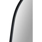 Close-up of the Orion Wall Mirror showing the slim curved black frame and reflective glass surface