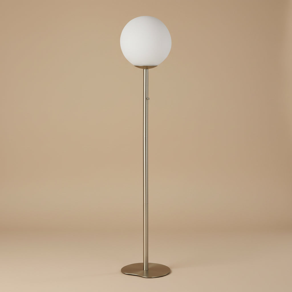 Pearl Glow Floor Lamp with round white globe shade and slim metallic stand on neutral background.