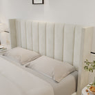 Close-up of Plush Velvet Storage Bed headboard showing vertical upholstered panels and soft velvet texture in a neutral bedroom