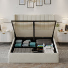 Plush Velvet Storage Bed with lifted hydraulic storage compartment showing neatly folded linens and pillows in a modern bedroom