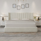 Plush Velvet Storage Bed with tall vertical panel headboard styled in a soft neutral bedroom with nightstands and wall art