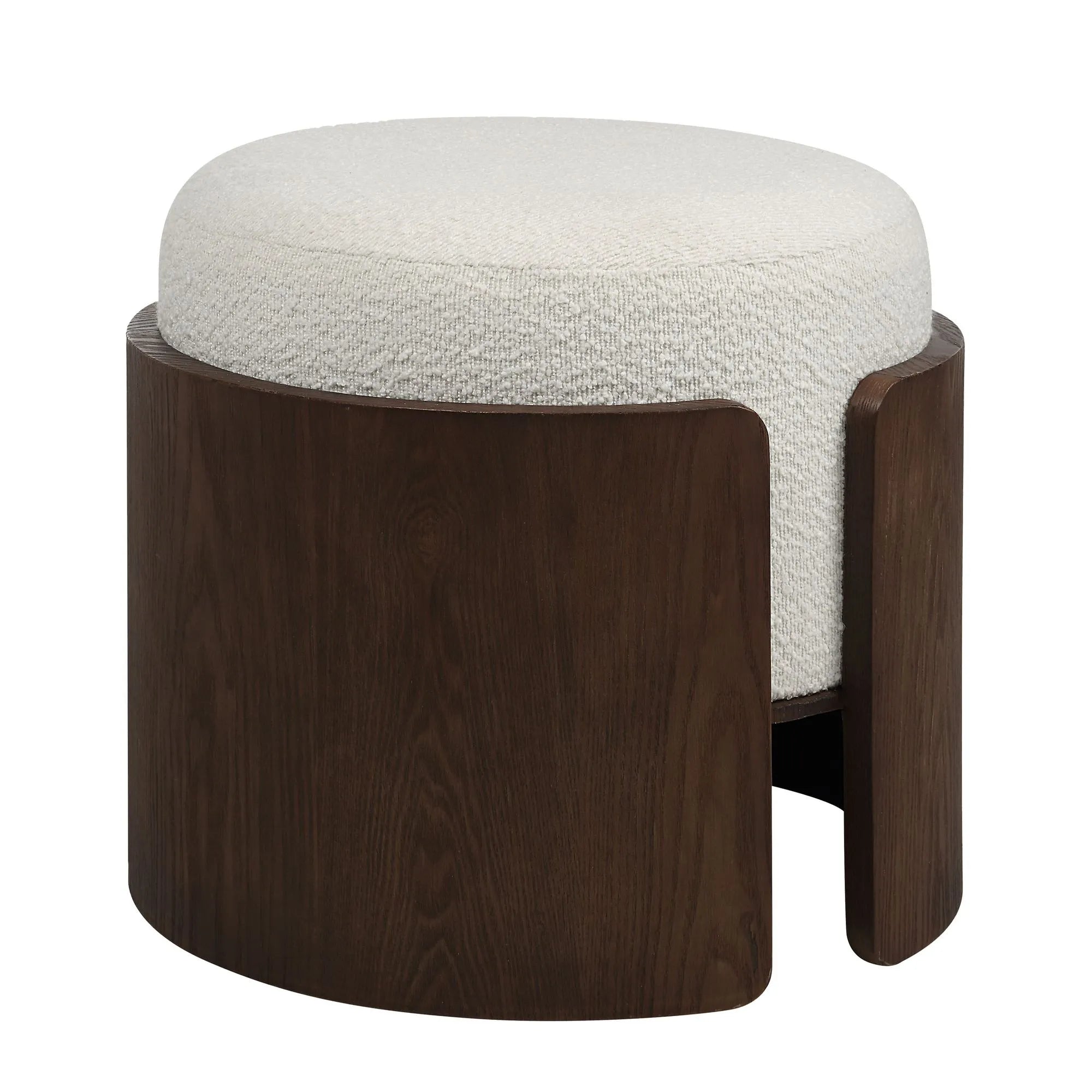 Full front view of the round Rondo vanity stool featuring a white bouclé cushion nested inside a curved dark wood base with a cutout detail.