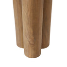 Close up view of the Ryn side table's structural base featuring three thick wooden pillar legs joined at the center.