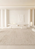 Sandy Oasis Rug styled in a minimal beige living room with low modular sofa and soft ambient lighting