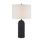 Sienna Sculpted Table Lamp in black with textured ceramic base and white fabric shade on plain white background