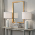 Sienna Sculpted Table Lamps styled on console table with mirror and ceramic decor in soft neutral entryway