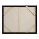 Back view of Silent Flight canvas showing sturdy wooden stretcher bars and pre-installed D-ring hanging hardware.