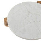 Close-up of Siona Marble Tray showing smooth round white marble top and natural wood leg details