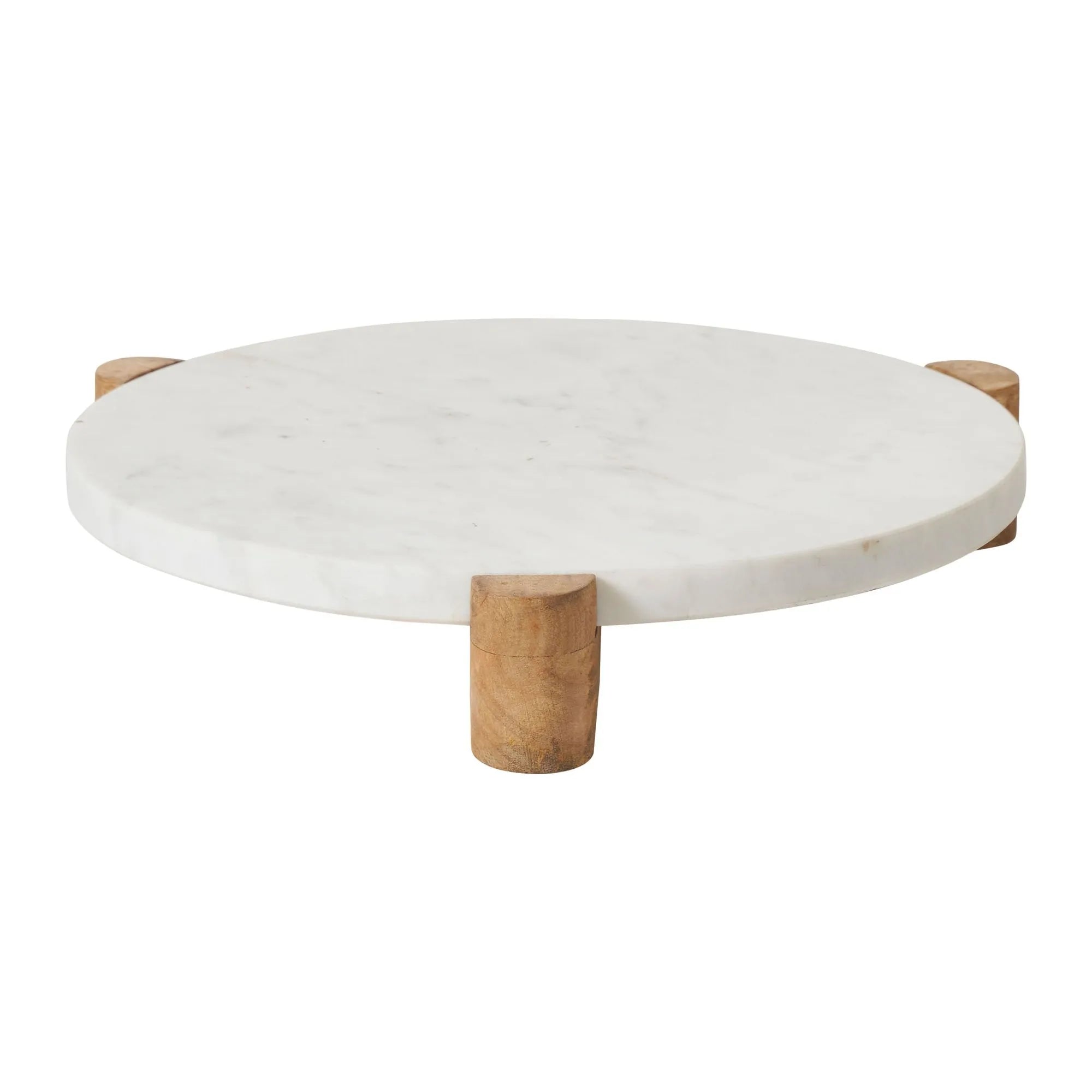 Siona Marble Tray side view showing round white marble top supported by four natural wood legs